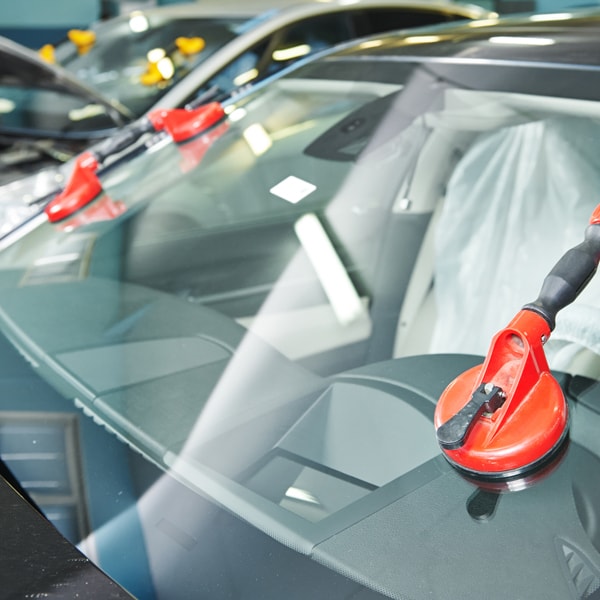 Which auto glass company to call when windshield is damaged  in Dorchester